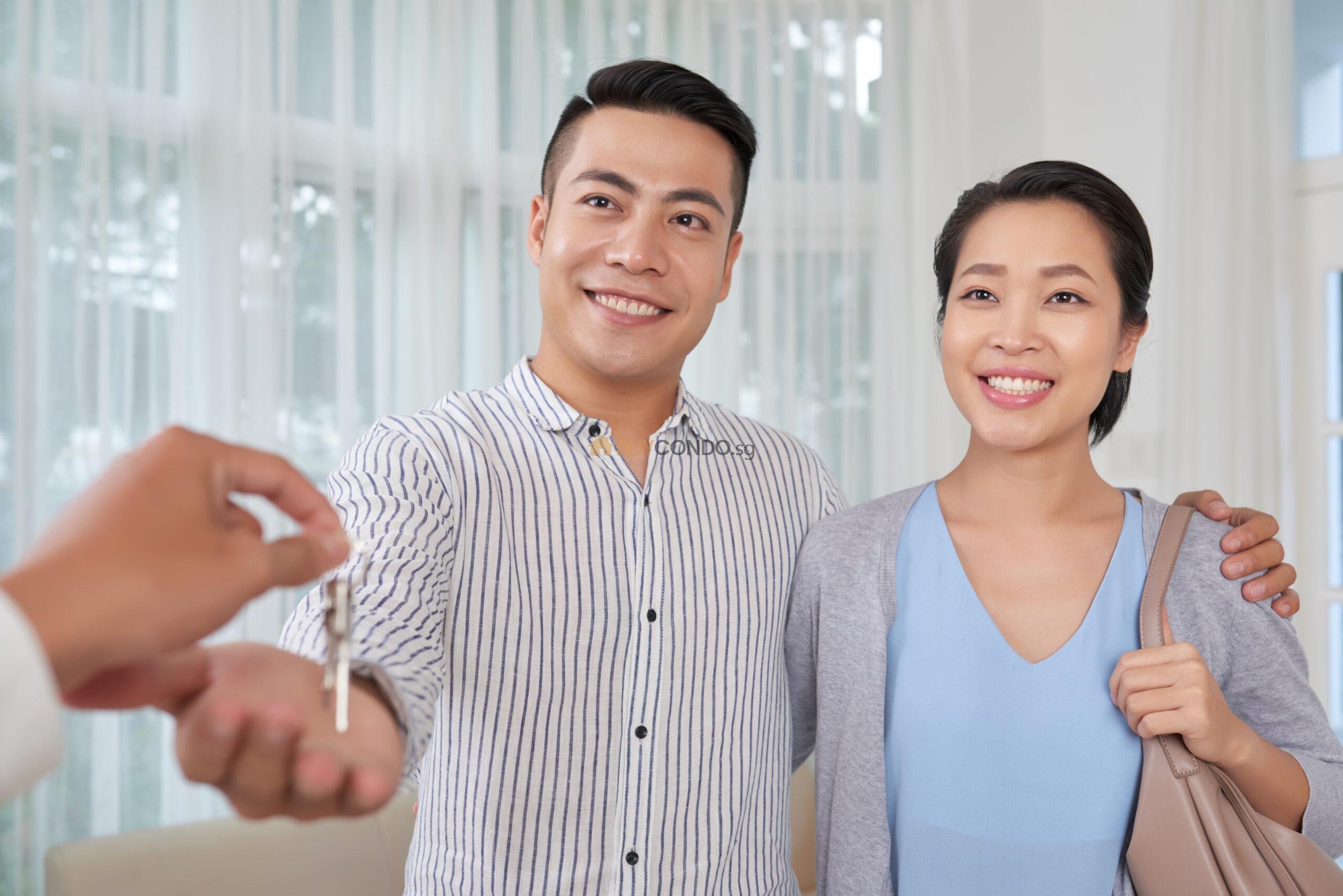 cheerful couple buying apartment scaled