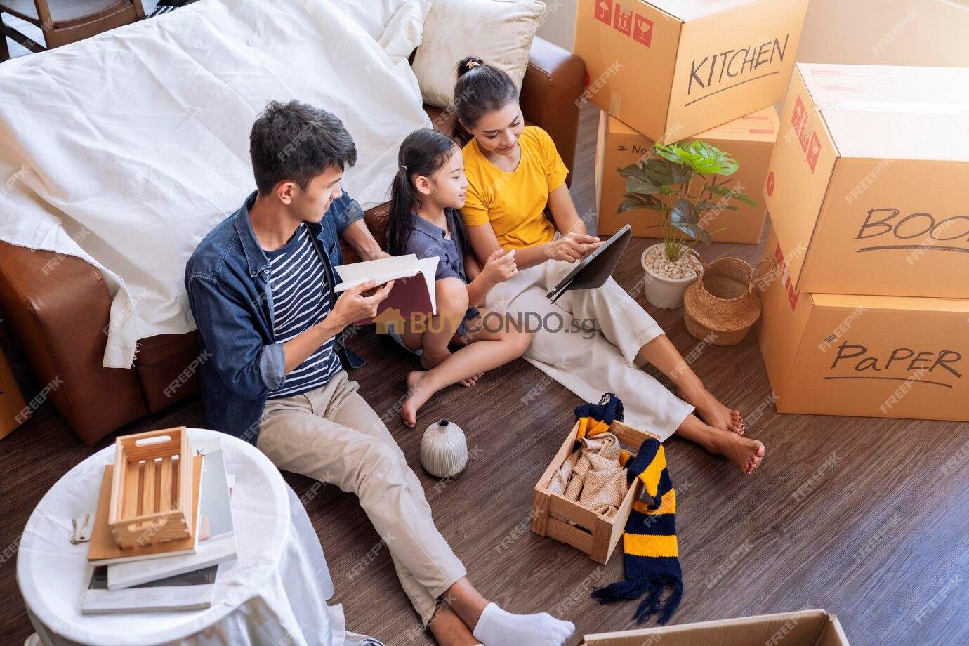 moving home conceptasian family relax leisure time sit together with cardboard box stuffdad mom daughter spending time together after finish packing stuff furniture home apartment moving 6096