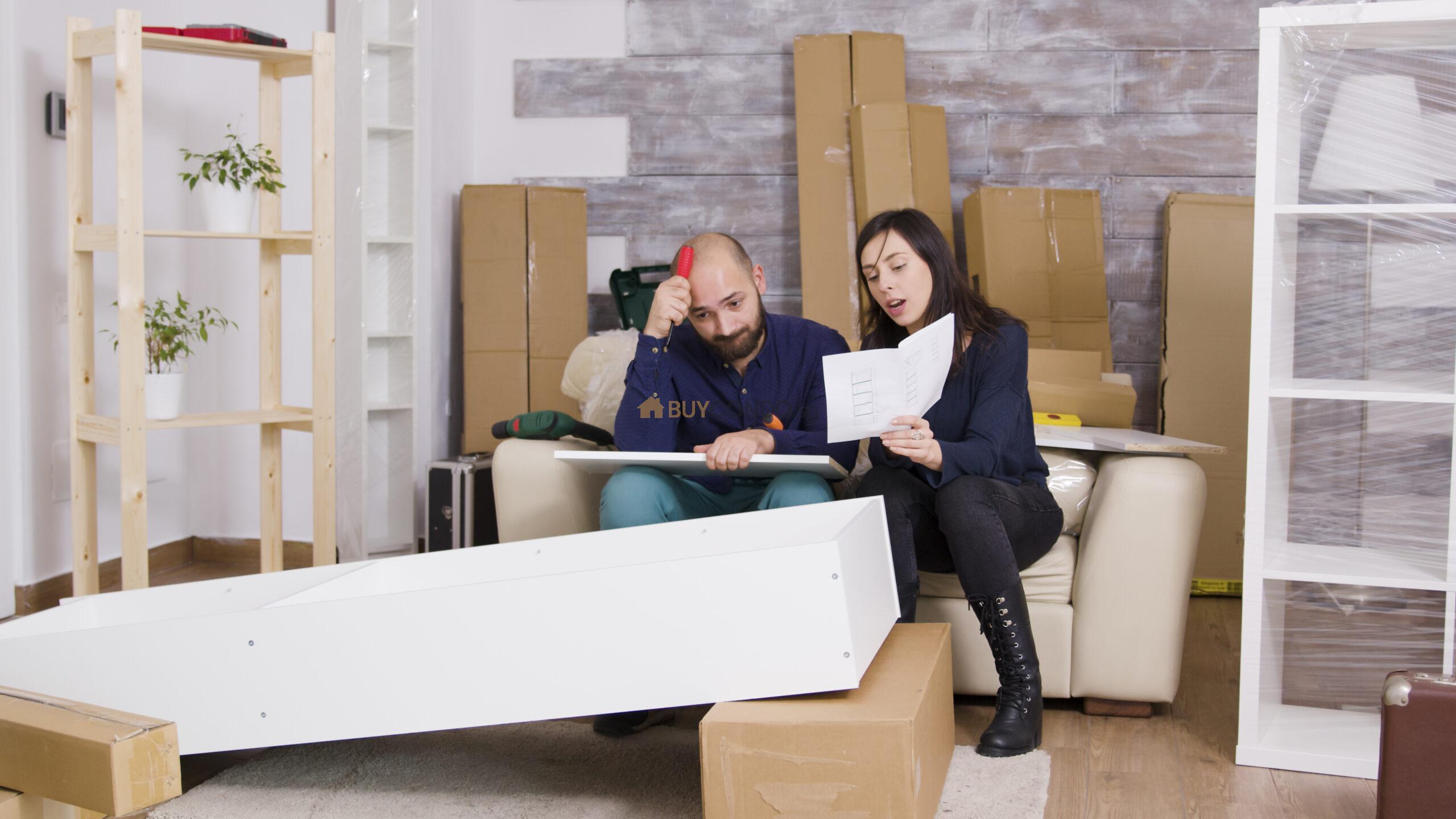 caucasian couple arguing while assembling shelf their new apartment girlfriend holding instructions scaled